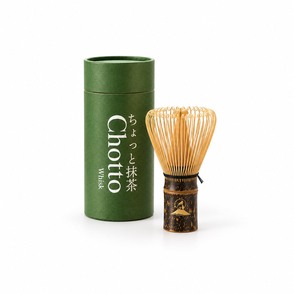 Chotto Matcha bamboo whisk with green cylindrical box on a white background