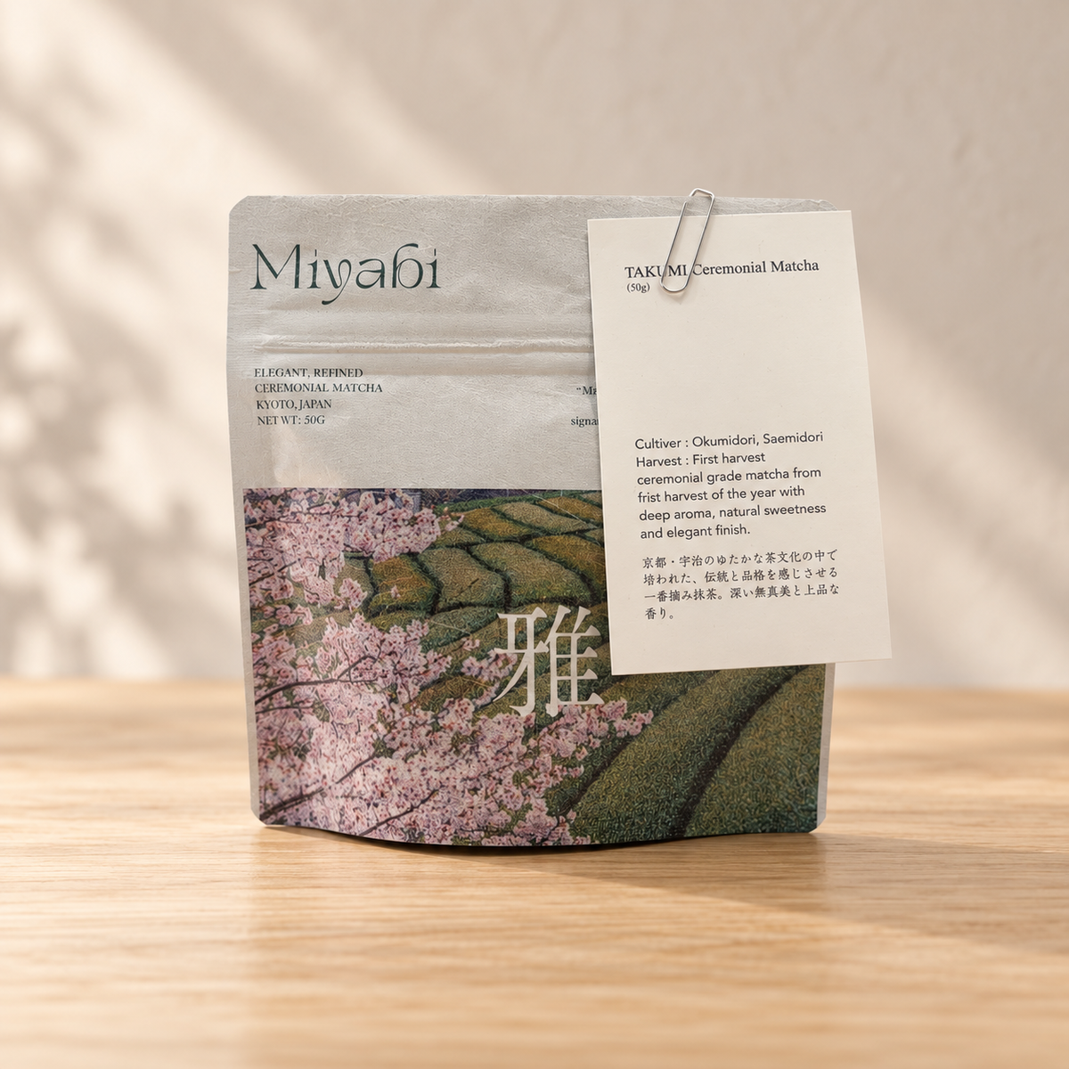 Miyabi Takumi ceremonial matcha 50g pouch with information card, styled