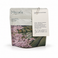 Miyabi Takumi ceremonial matcha 50g pouch with information card, white background