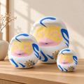white daruma three sizes styled